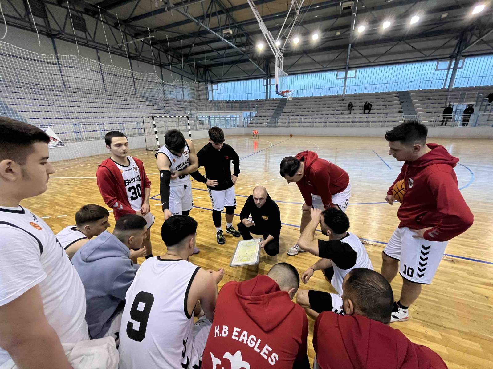Coach talking to players